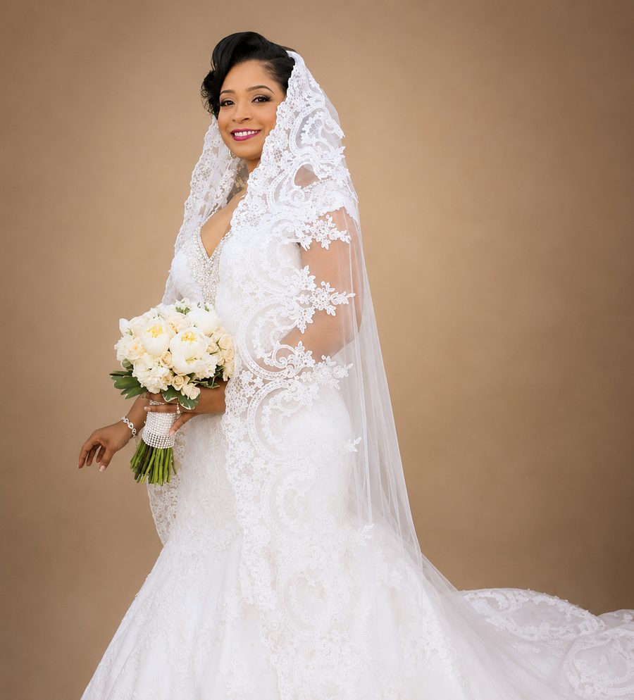 Custom lace bridal gown with mantilla veil by Customly Yours Fashion