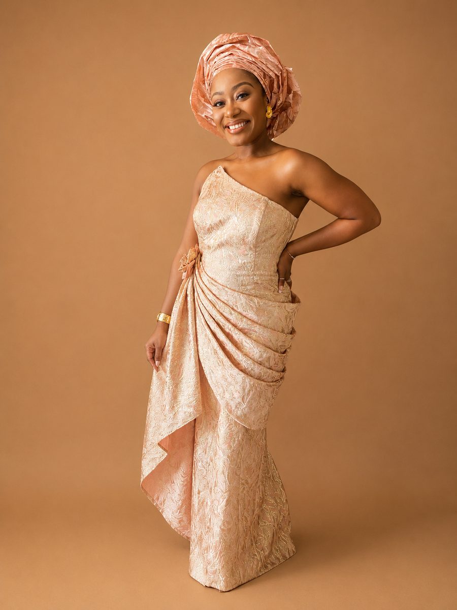 Traditional peach gele and iro ensemble tailored by Customly Yours Fashion